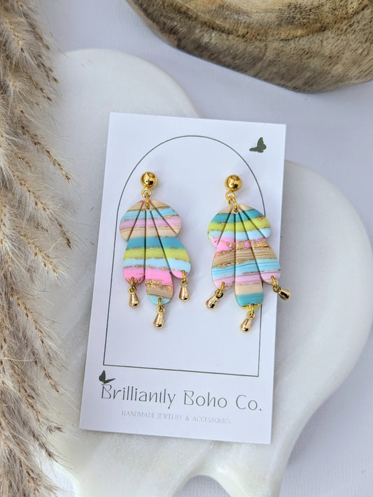 Pastel Seashell With Gold Tassels